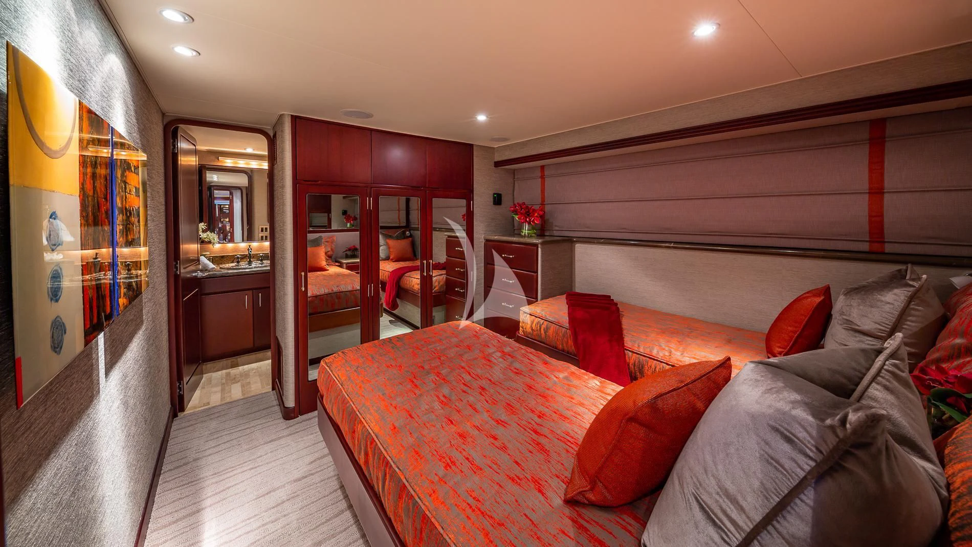 a bedroom with a bed and a couch aboard DESTINY Yacht for Sale