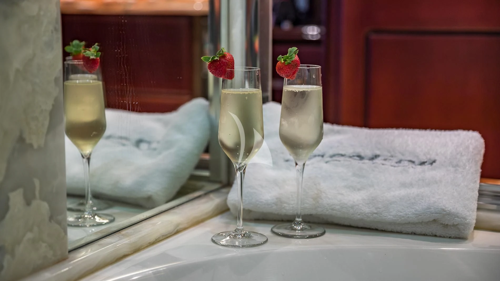 champagne glasses on a table aboard DESTINY Yacht for Sale