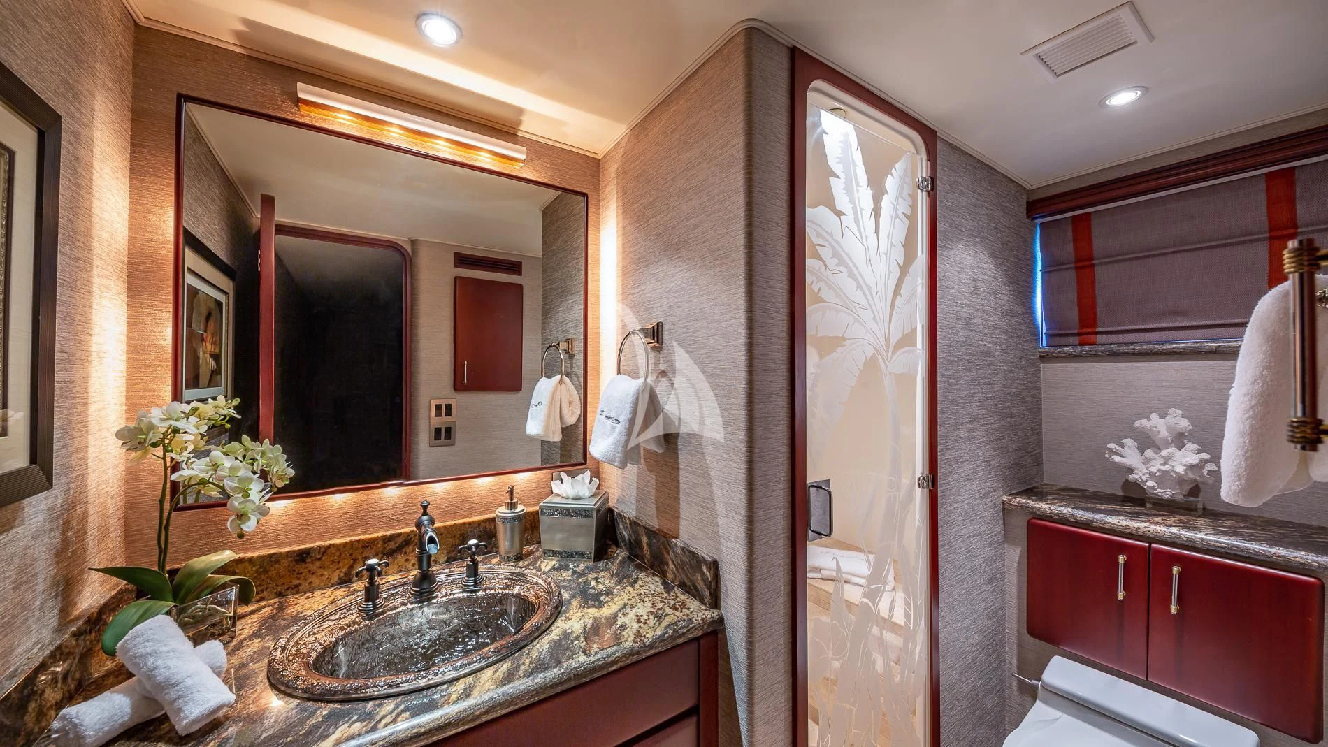 a bathroom with a sink and a mirror aboard DESTINY Yacht for Sale