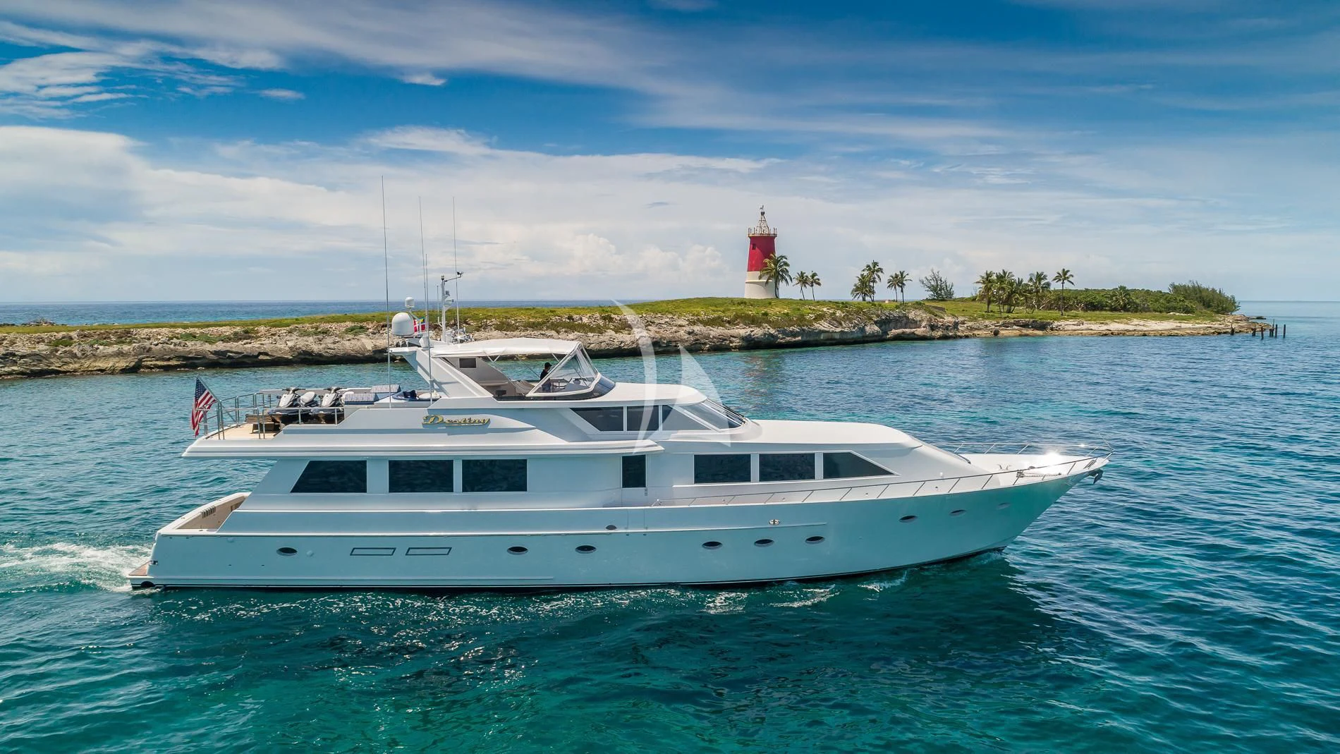 a white yacht in the water aboard DESTINY Yacht for Sale
