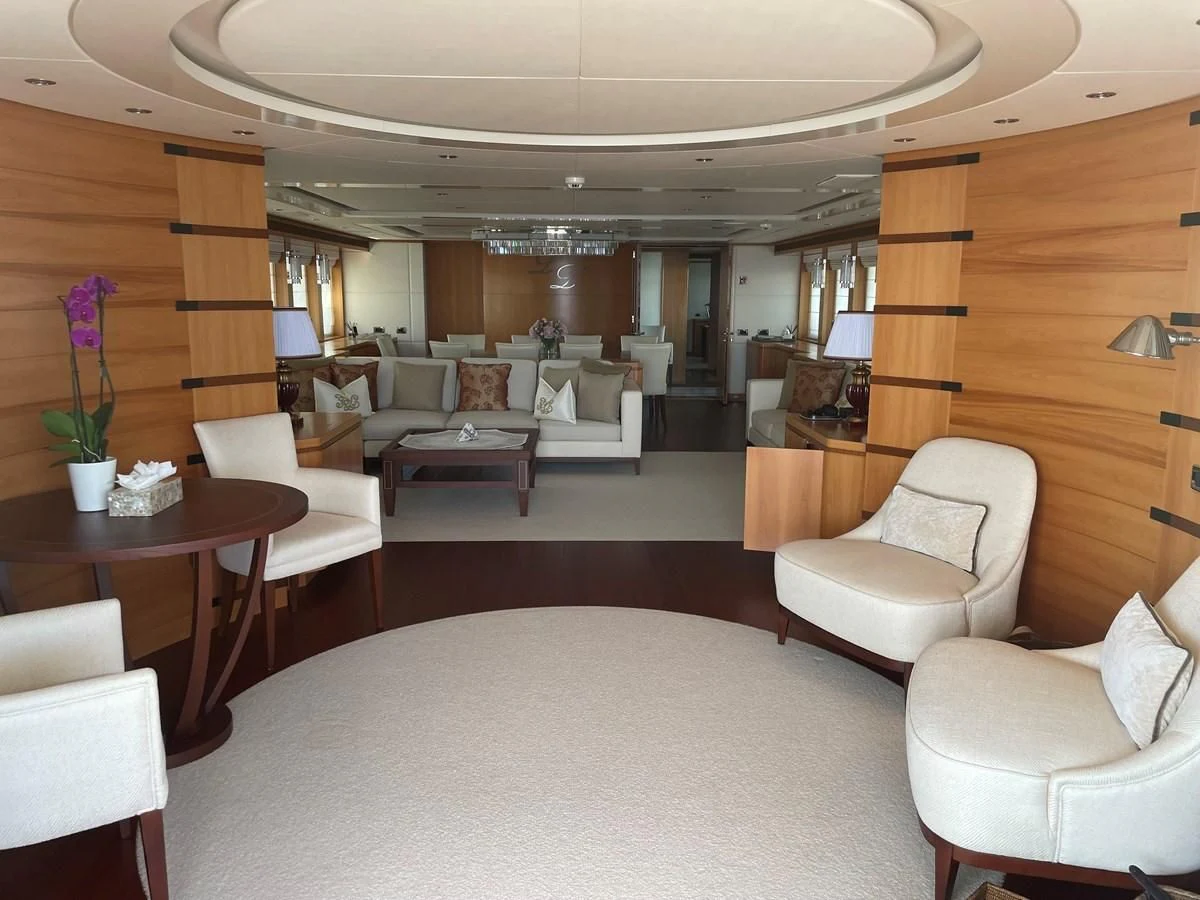 a living room with a large window aboard MORDAN Yacht for Sale