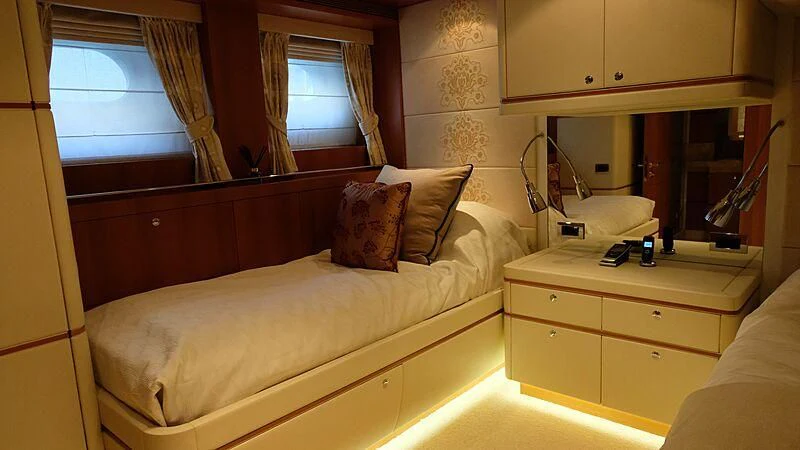 a room with a bed and a window aboard MORDAN Yacht for Sale