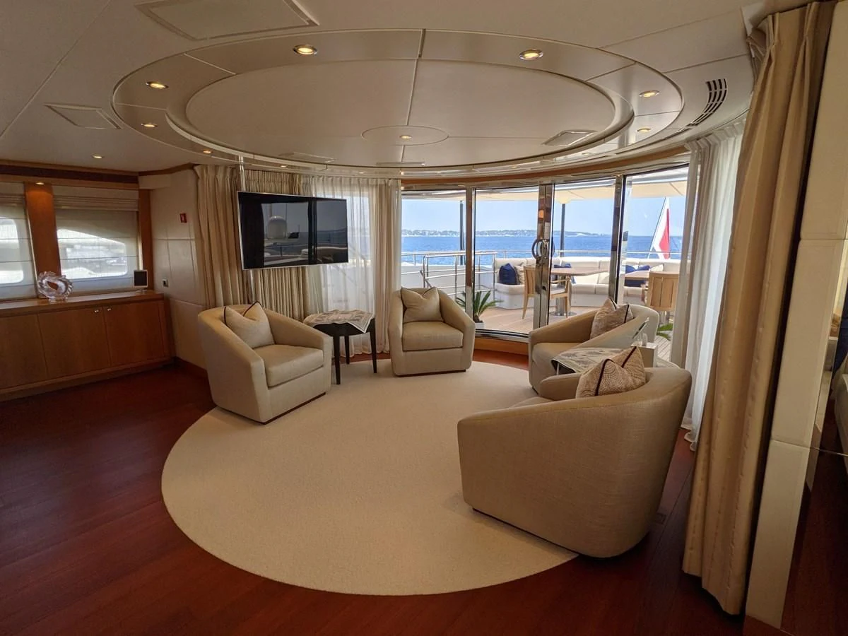 a living room with a large window aboard MORDAN Yacht for Sale