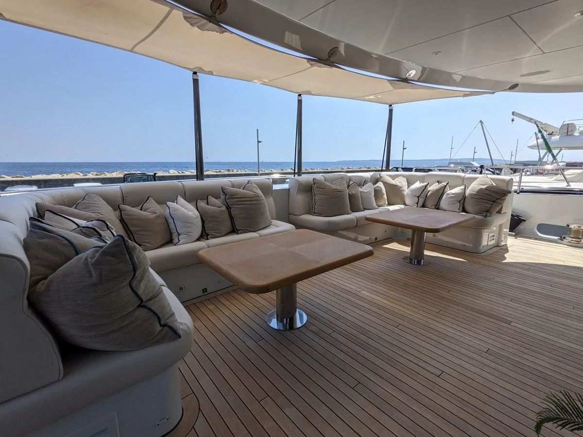 a living room with a large window aboard MORDAN Yacht for Sale