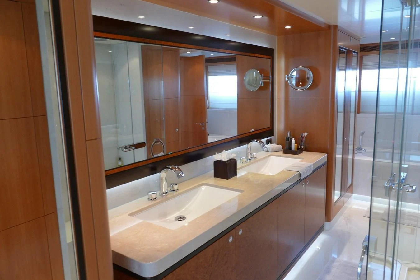 a bathroom with a large mirror aboard MORDAN Yacht for Sale