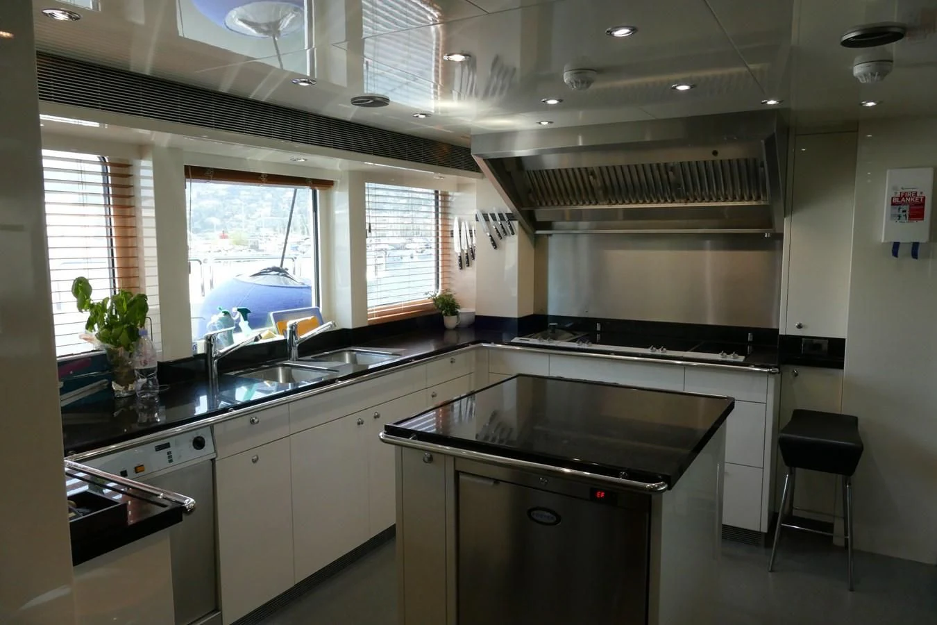 a kitchen with a window aboard MORDAN Yacht for Sale