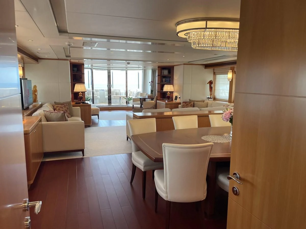 a large living room with a large window aboard MORDAN Yacht for Sale