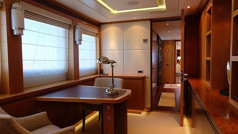 a kitchen with a table and a sink aboard MORDAN Yacht for Sale