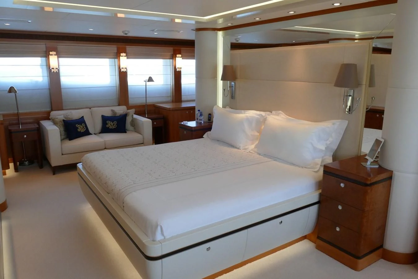 a hotel room with a bed and a couch aboard MORDAN Yacht for Sale