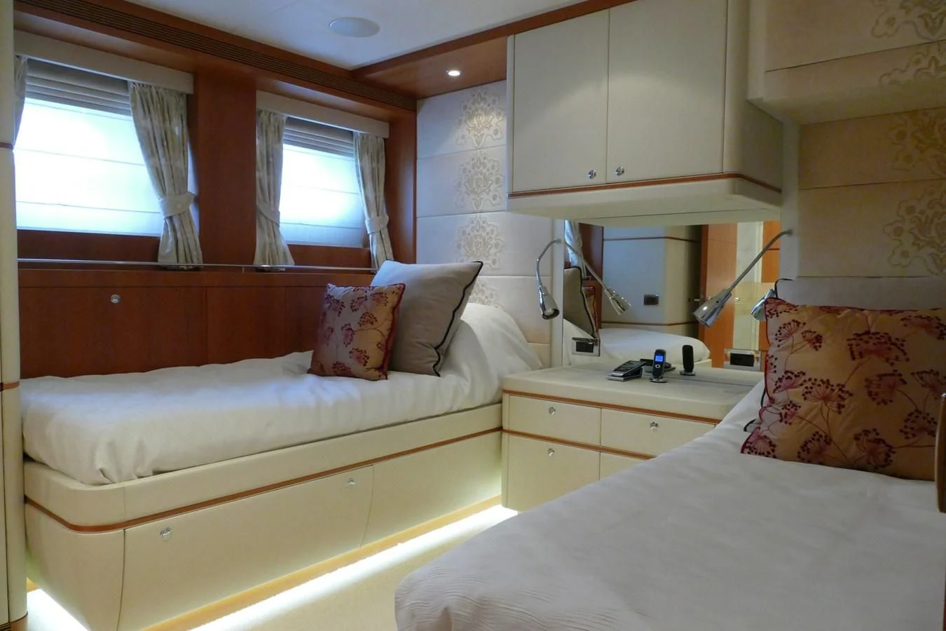 a couple of beds in a small room aboard MORDAN Yacht for Sale