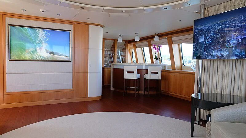 a room with a table and chairs aboard MORDAN Yacht for Sale