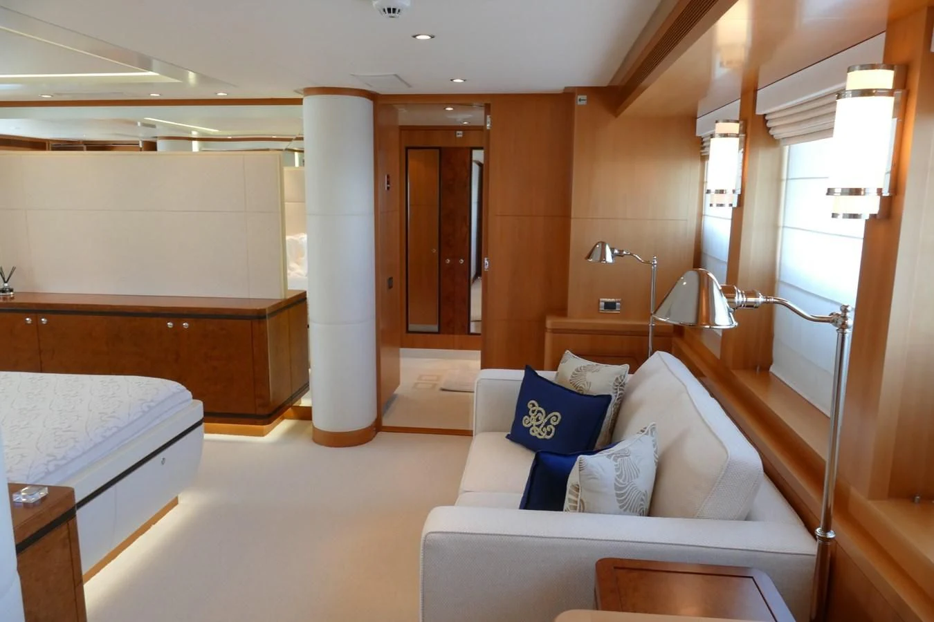 a room with a bed and a desk aboard MORDAN Yacht for Sale