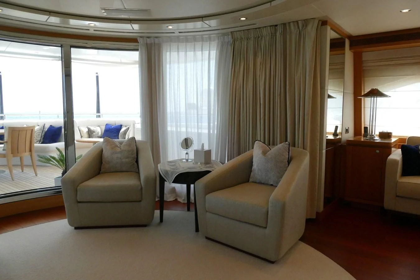 a living room with a couch and a table aboard MORDAN Yacht for Sale