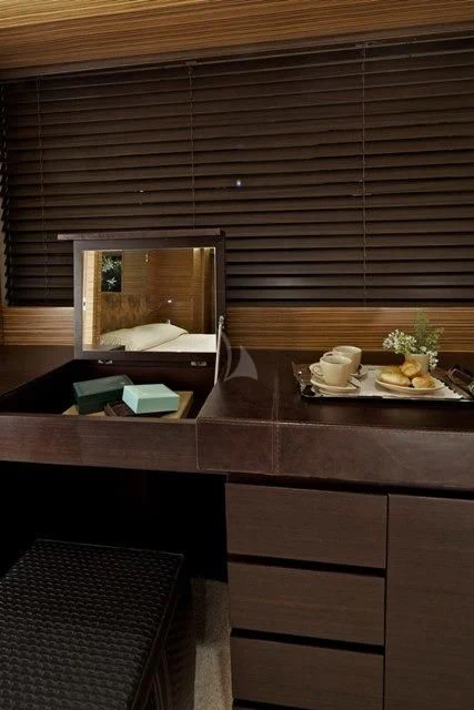 a room with a mirror and a bed aboard GIOE I Yacht for Sale