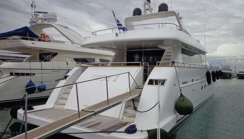 a boat docked at a pier aboard GIOE I Yacht for Sale