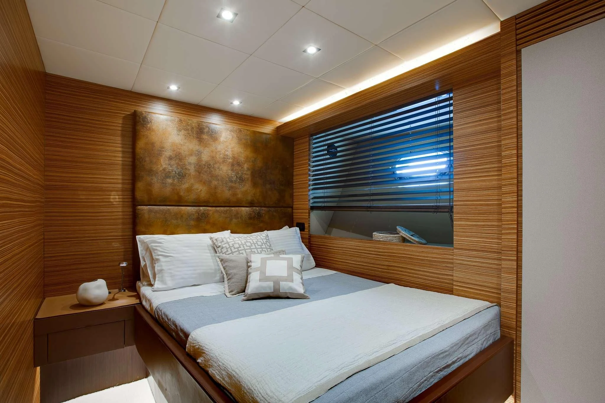 a bed in a room aboard GIOE I Yacht for Sale