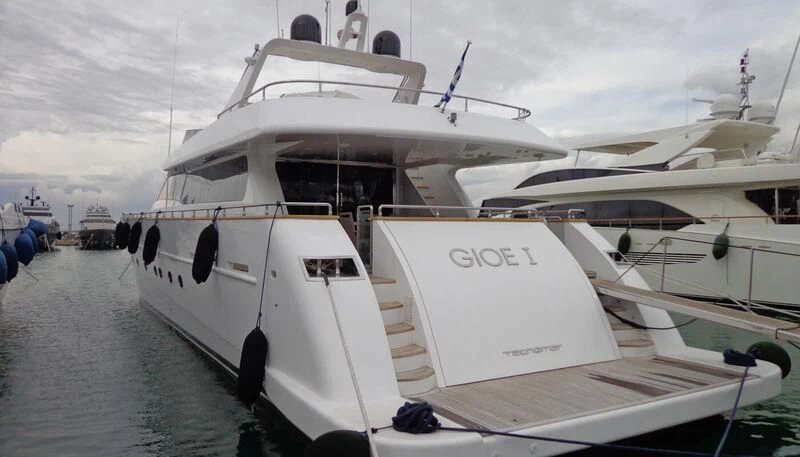 a boat docked at a pier aboard GIOE I Yacht for Sale