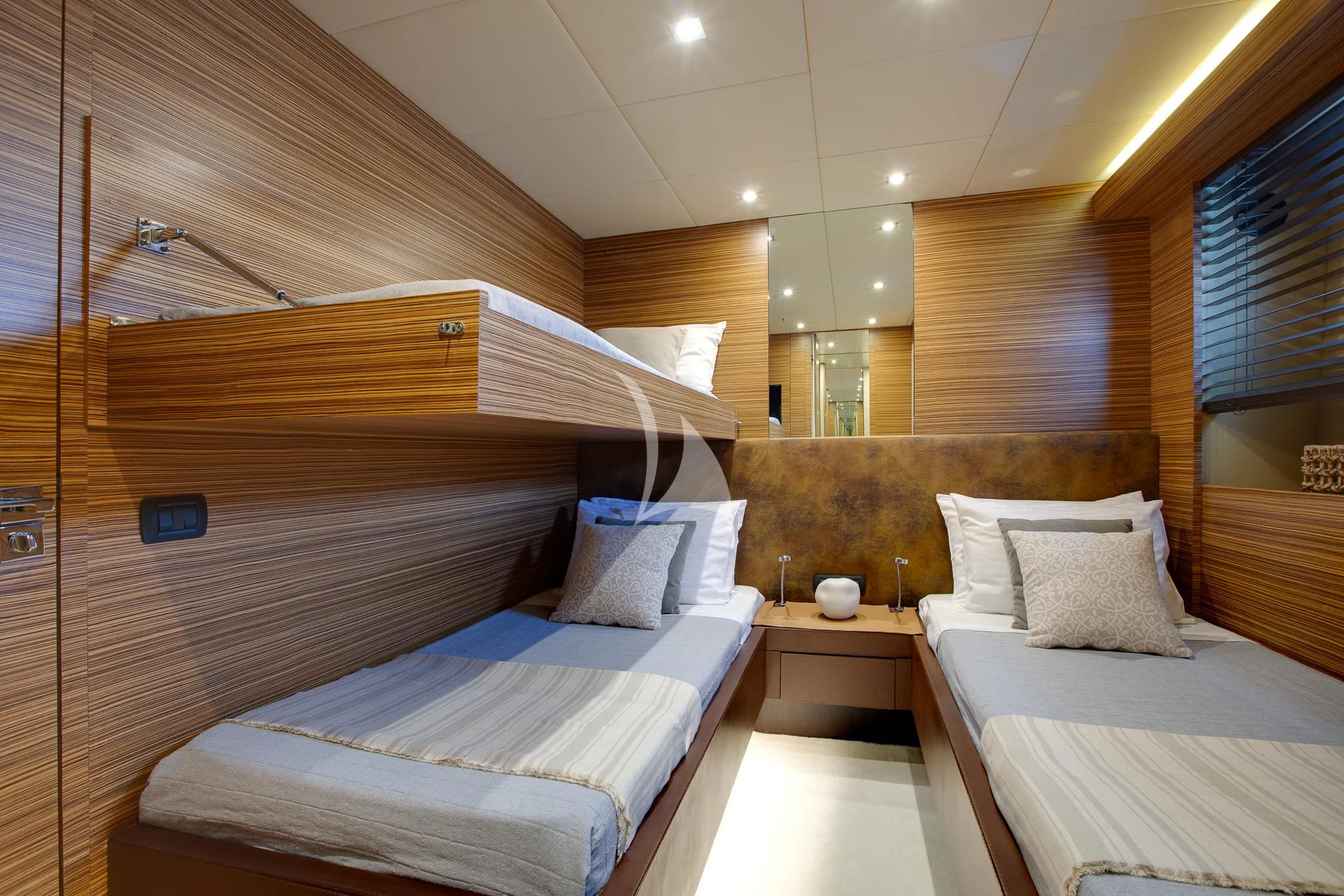 a room with two beds aboard GIOE I Yacht for Sale