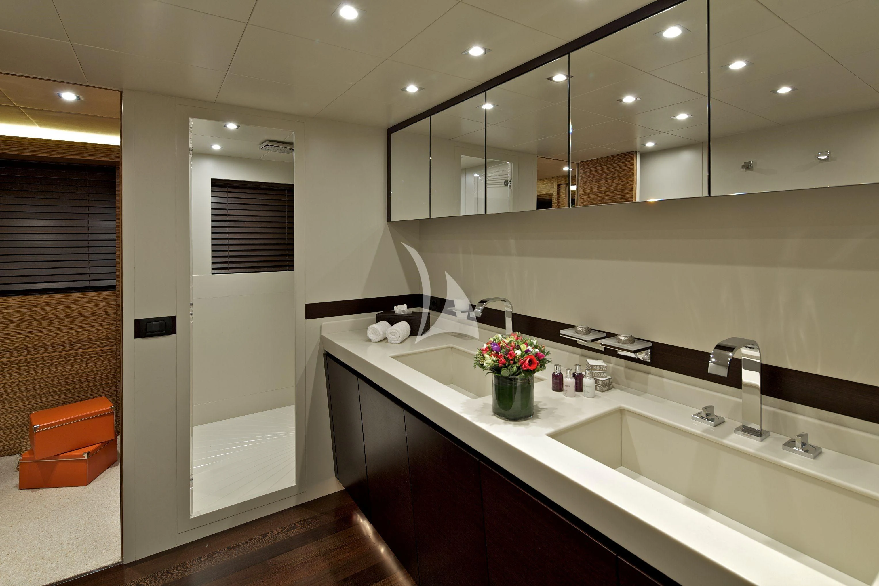 a bathroom with a sink and a mirror aboard GIOE I Yacht for Sale