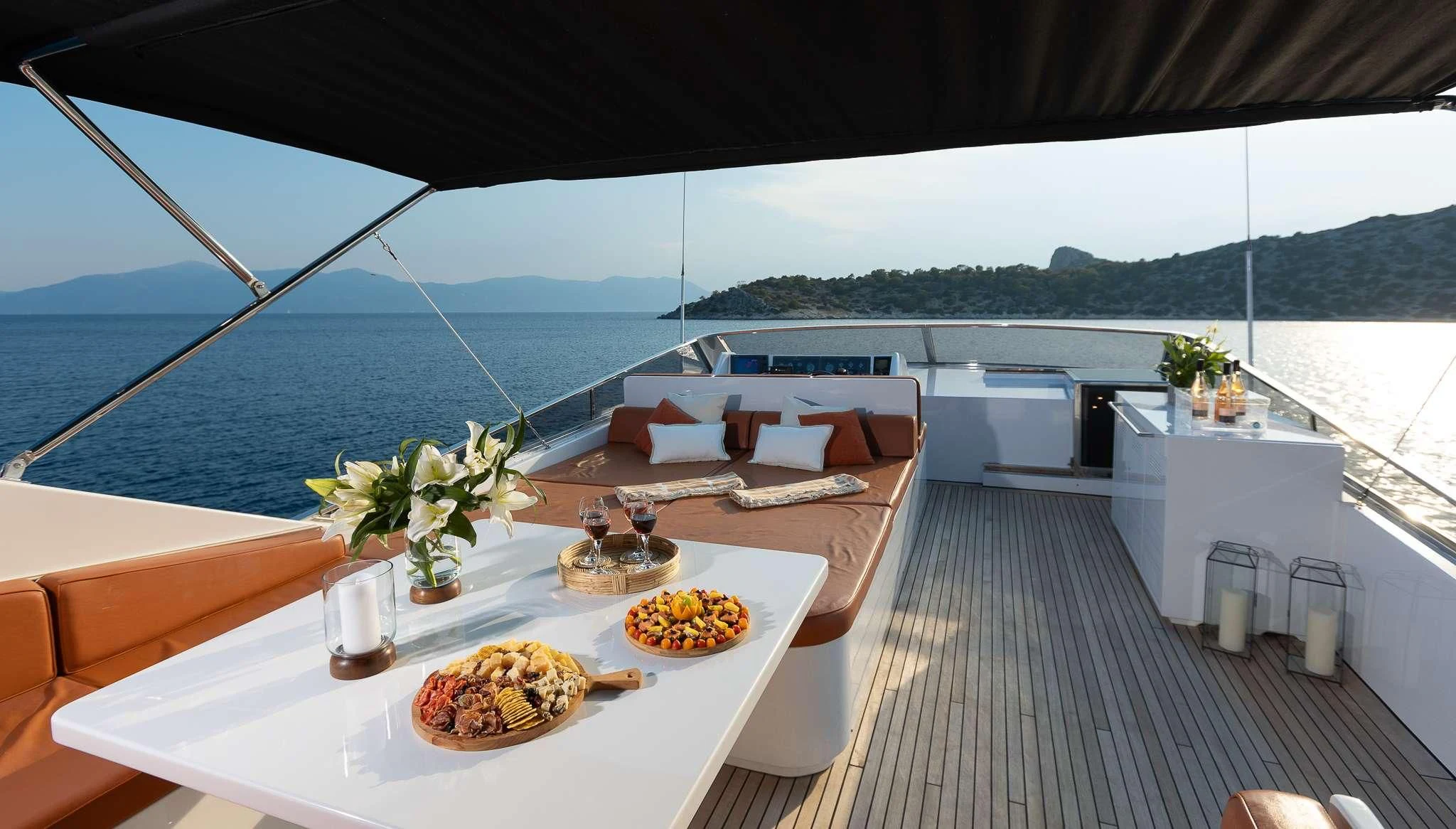 a table with food on it aboard GIOE I Yacht for Sale