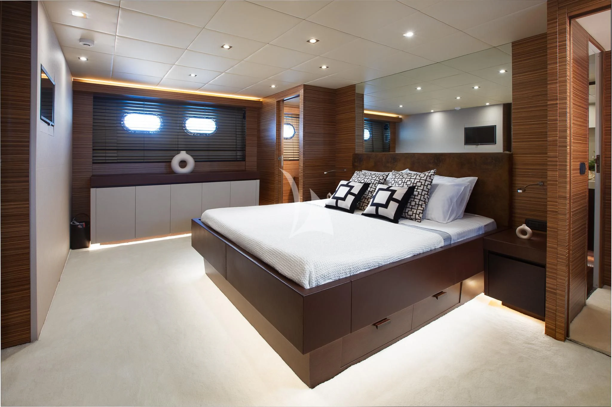 a large bed in a room aboard GIOE I Yacht for Sale