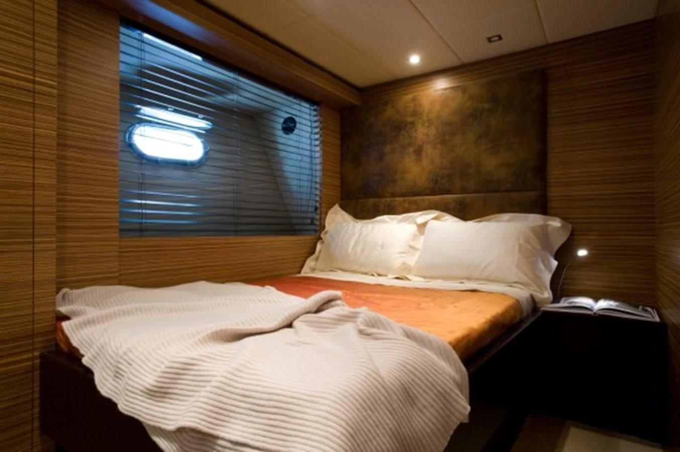 a room with two beds aboard GIOE I Yacht for Sale