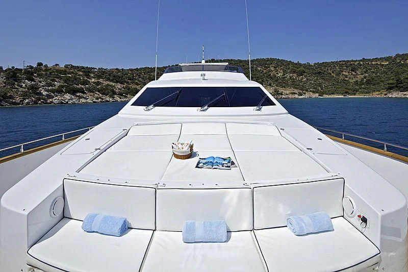 a white boat on a body of water aboard GIOE I Yacht for Sale