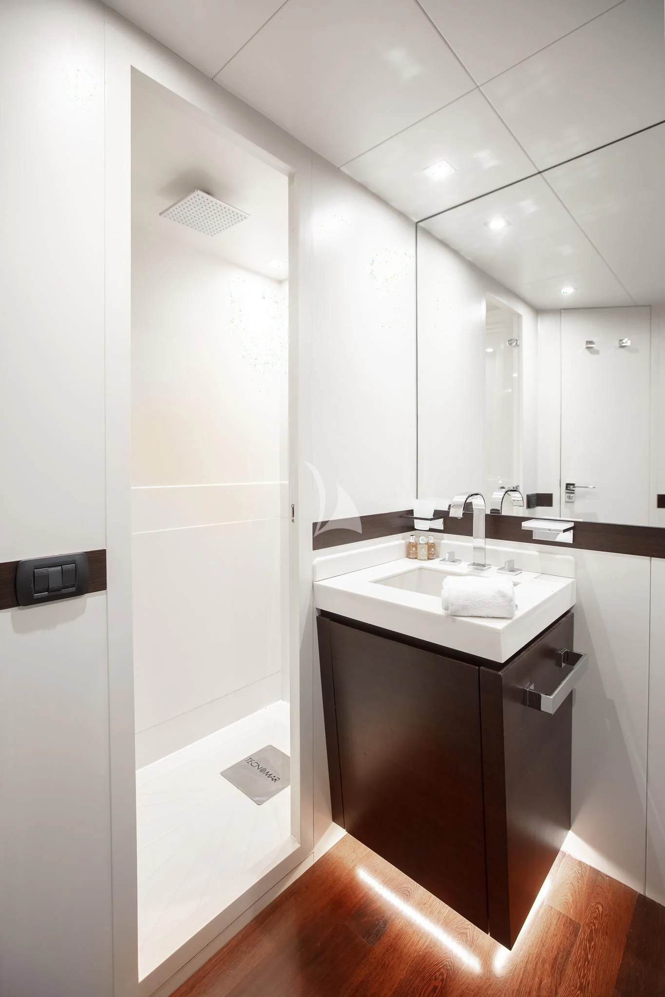 a bathroom with a sink and a mirror aboard GIOE I Yacht for Sale