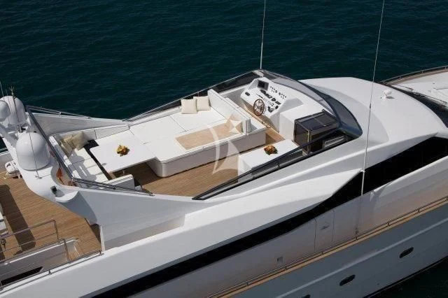 a white boat on a deck aboard GIOE I Yacht for Sale