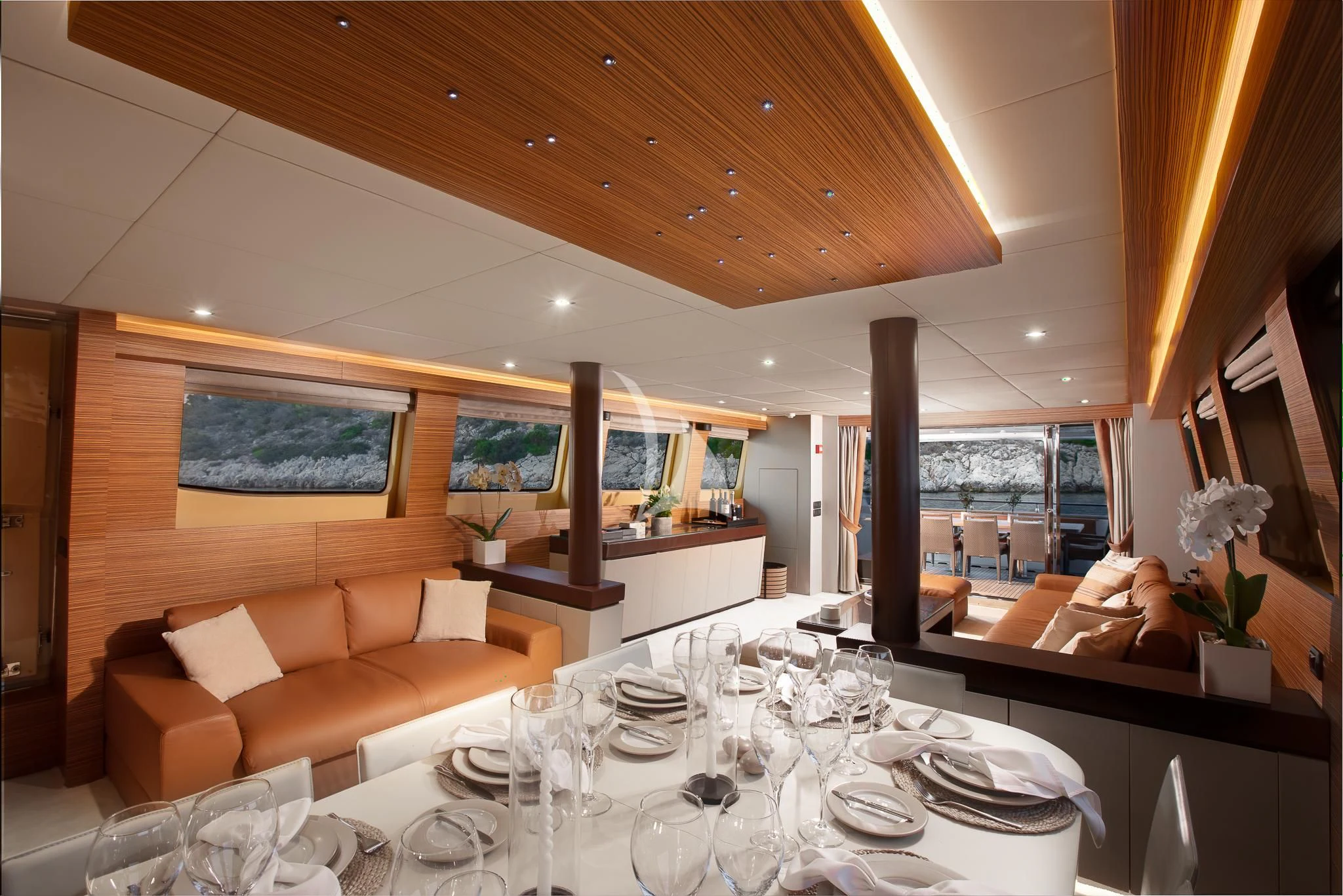 a large dining room with a large table and chairs aboard GIOE I Yacht for Sale
