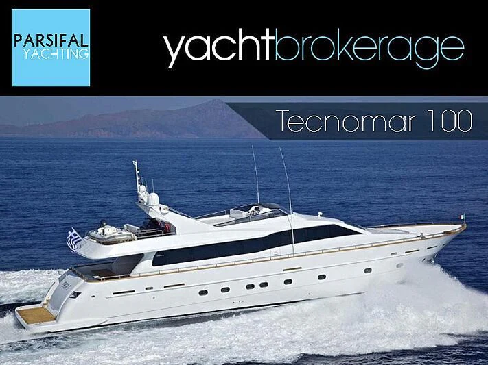a white yacht on a beach aboard GIOE I Yacht for Sale