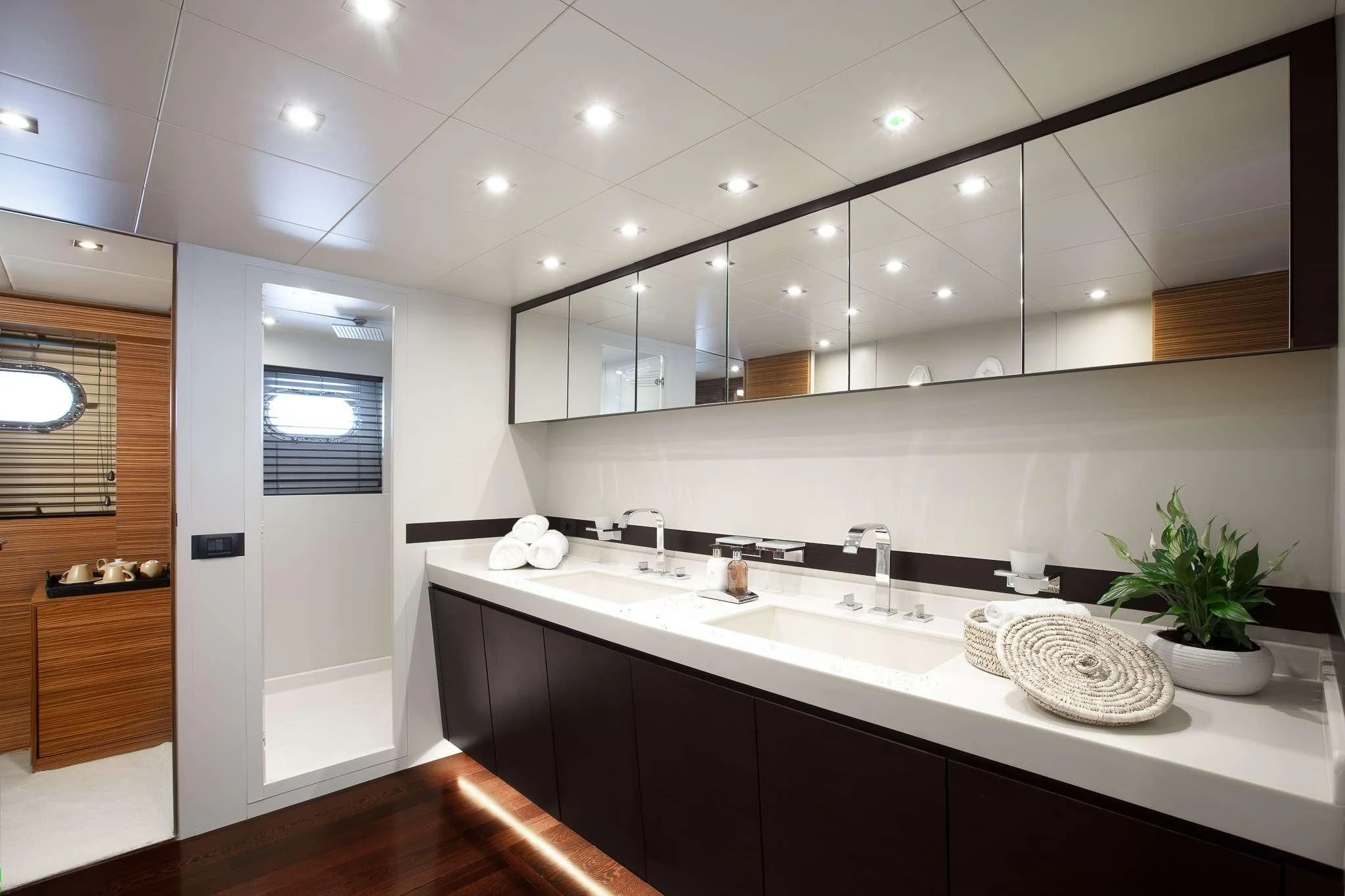a kitchen with a sink and a mirror aboard GIOE I Yacht for Sale