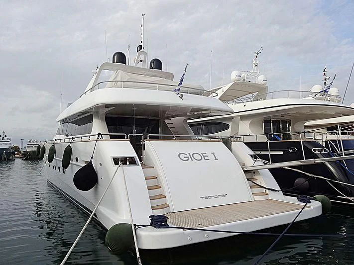 a white yacht docked aboard GIOE I Yacht for Sale