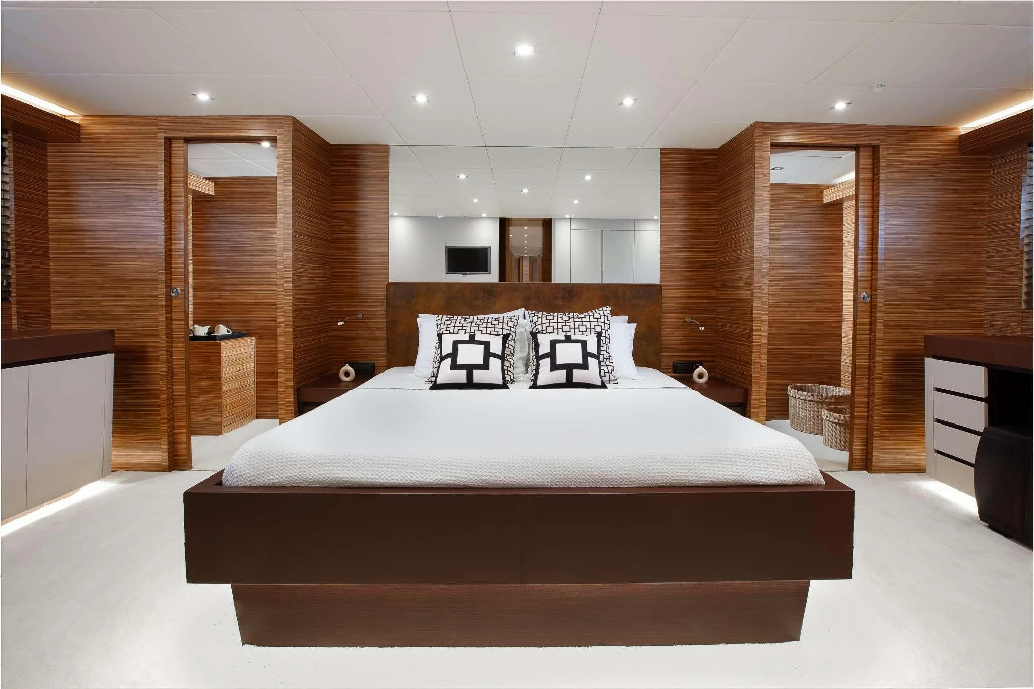 a large bed in a room aboard GIOE I Yacht for Sale