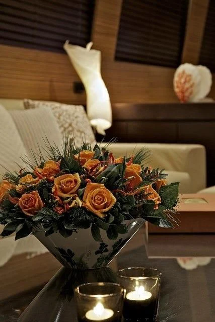 a vase with flowers aboard GIOE I Yacht for Sale