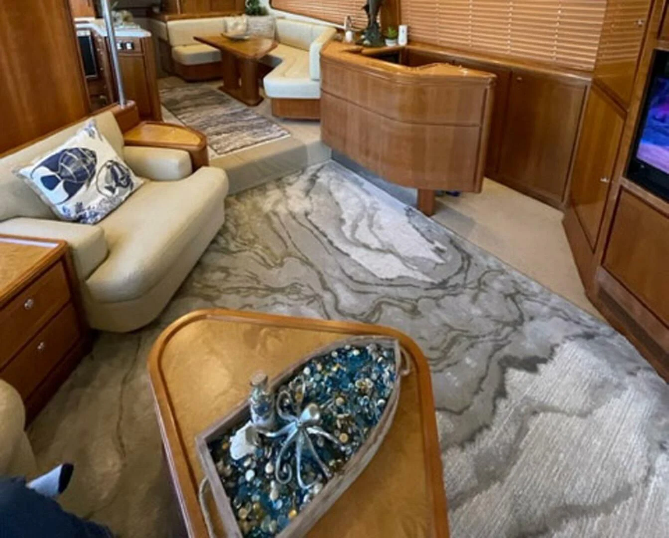 a room with a chair and a rug aboard REEL BUSY Yacht for Sale