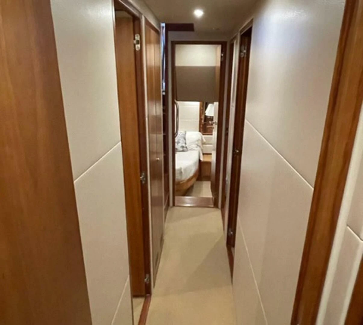 a bathroom with a large mirror aboard REEL BUSY Yacht for Sale