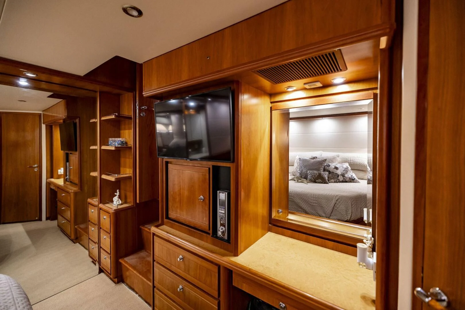 a room with a bed and a tv aboard REEL BUSY Yacht for Sale