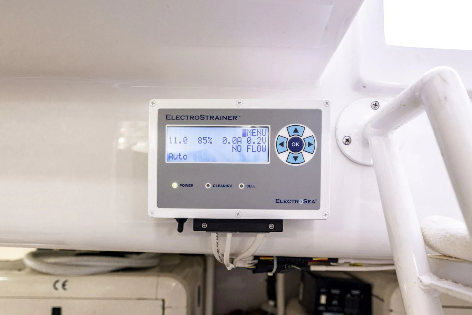 a white machine with a screen aboard REEL BUSY Yacht for Sale