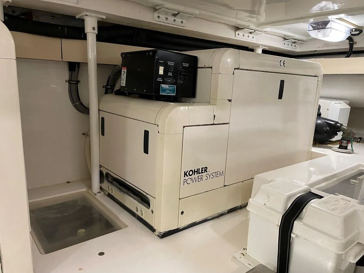 a machine in a room aboard REEL BUSY Yacht for Sale
