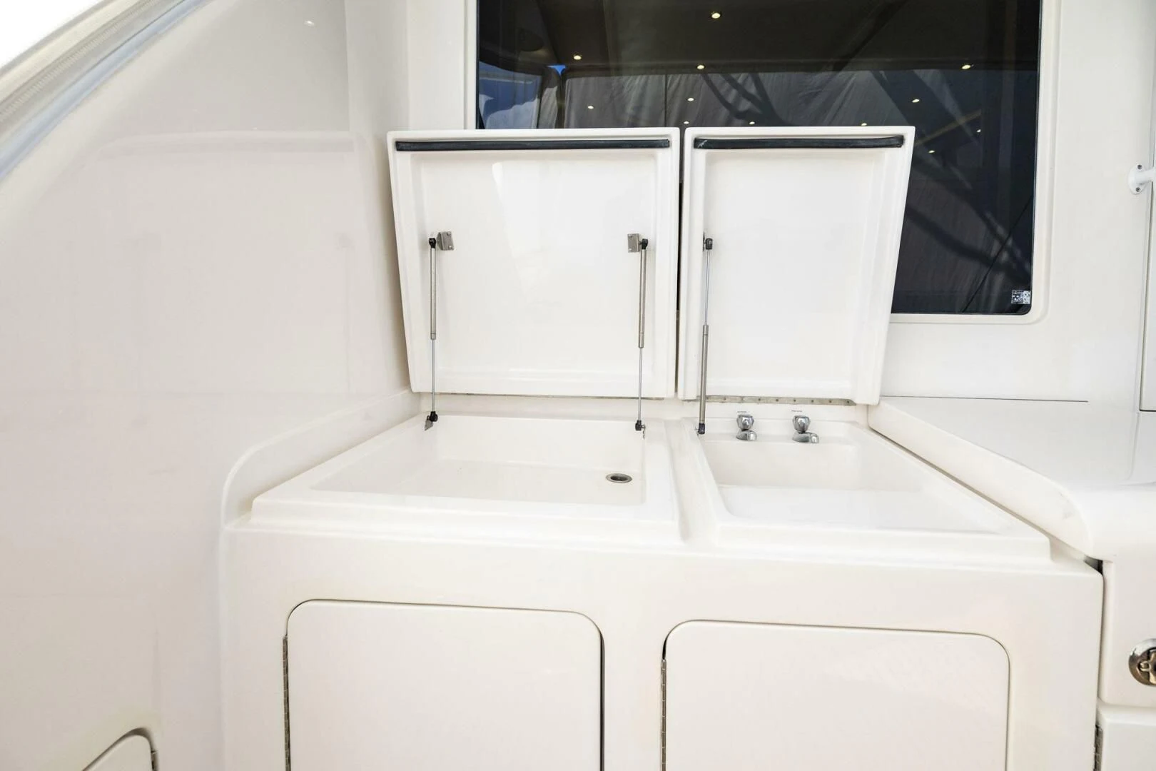 a white machine on a counter aboard REEL BUSY Yacht for Sale