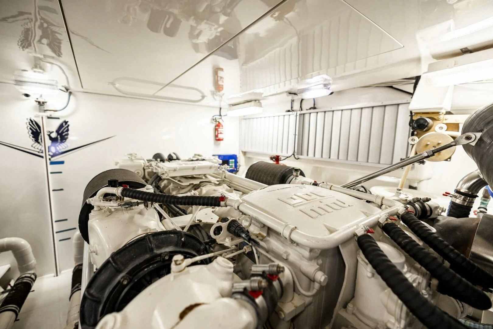 a large white machine with pipes aboard REEL BUSY Yacht for Sale