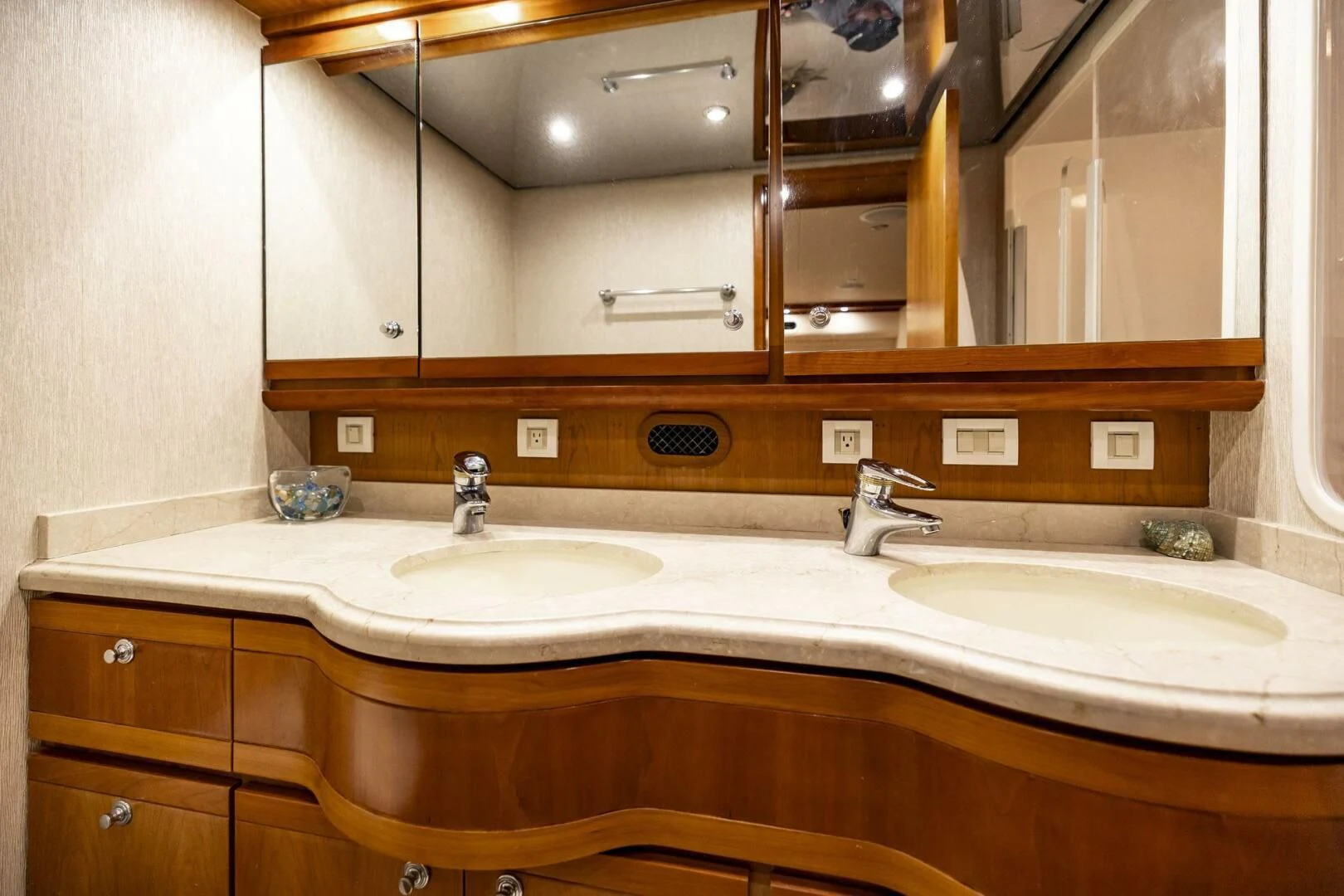 a bathroom with two sinks aboard REEL BUSY Yacht for Sale