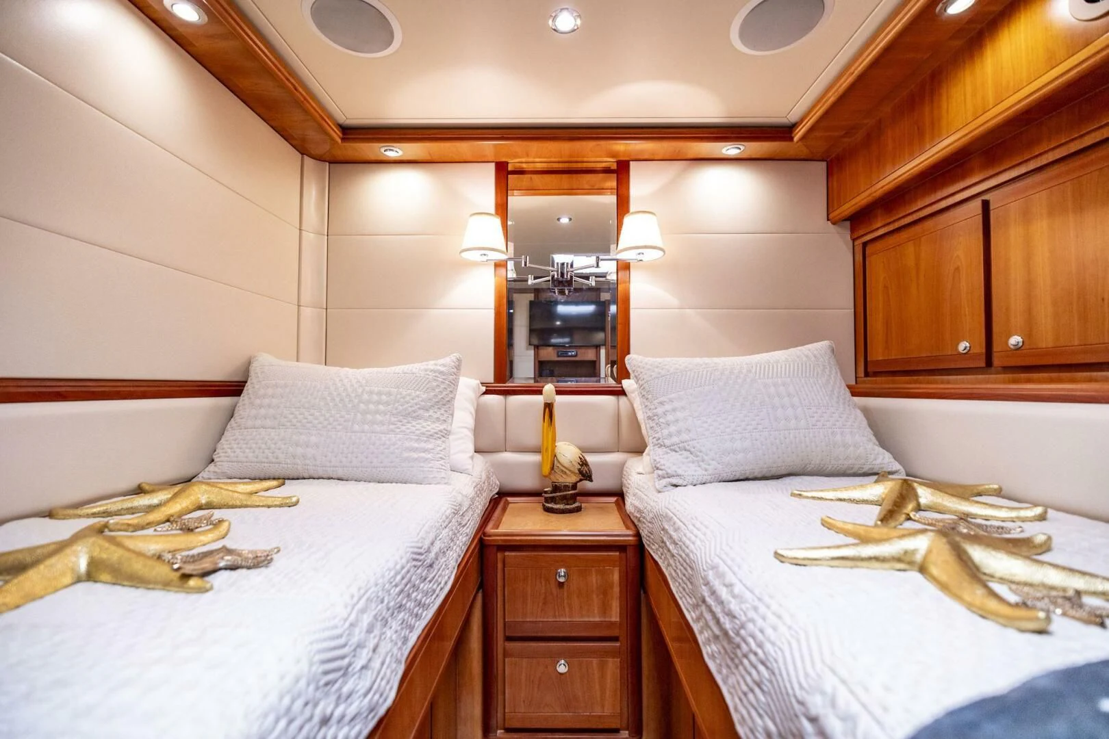 a couple of beds in a hotel room aboard REEL BUSY Yacht for Sale