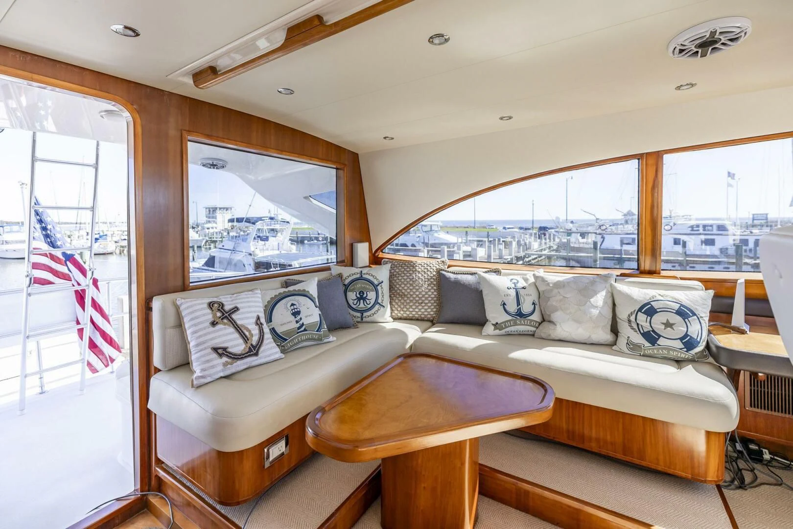 a living room with a large window aboard REEL BUSY Yacht for Sale