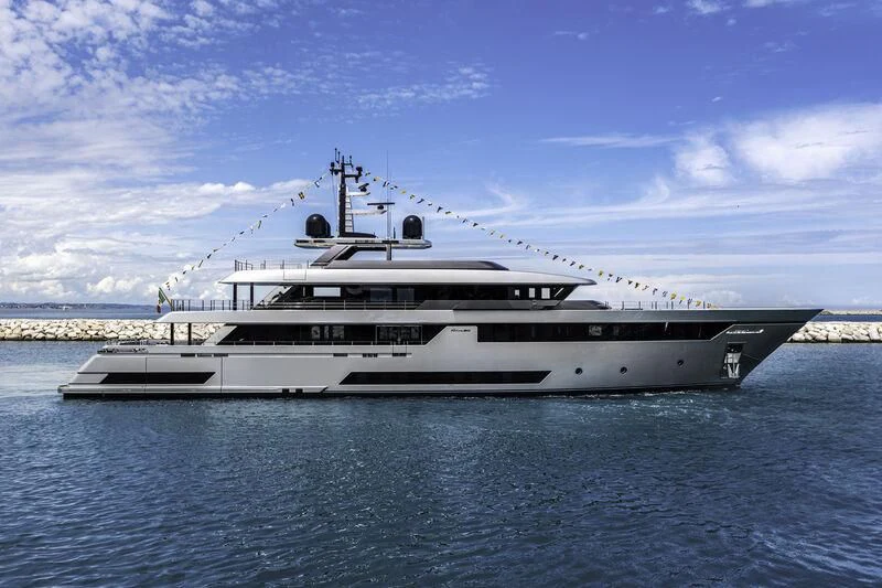 a large white ship in the water aboard FORA Yacht for Sale