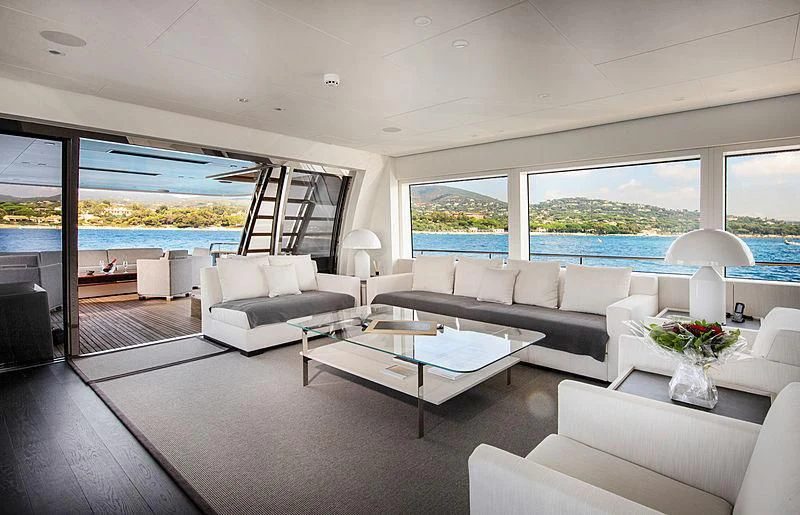 a living room with a large window aboard JANGADA Yacht for Sale