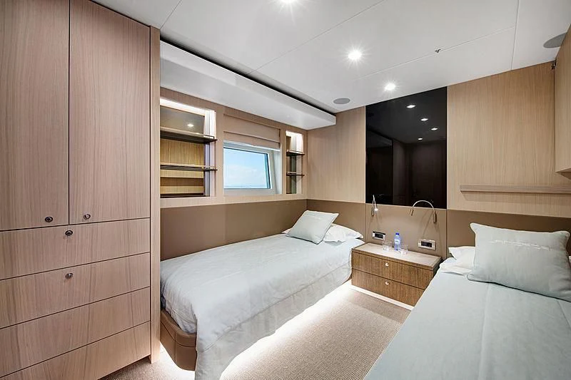 a room with a bed and a cupboard aboard JANGADA Yacht for Sale