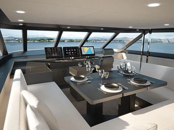 a table with plates and glasses on it aboard JANGADA Yacht for Sale