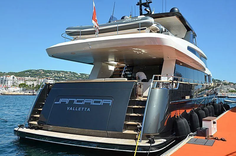 a large boat with a large ship on the deck aboard JANGADA Yacht for Sale